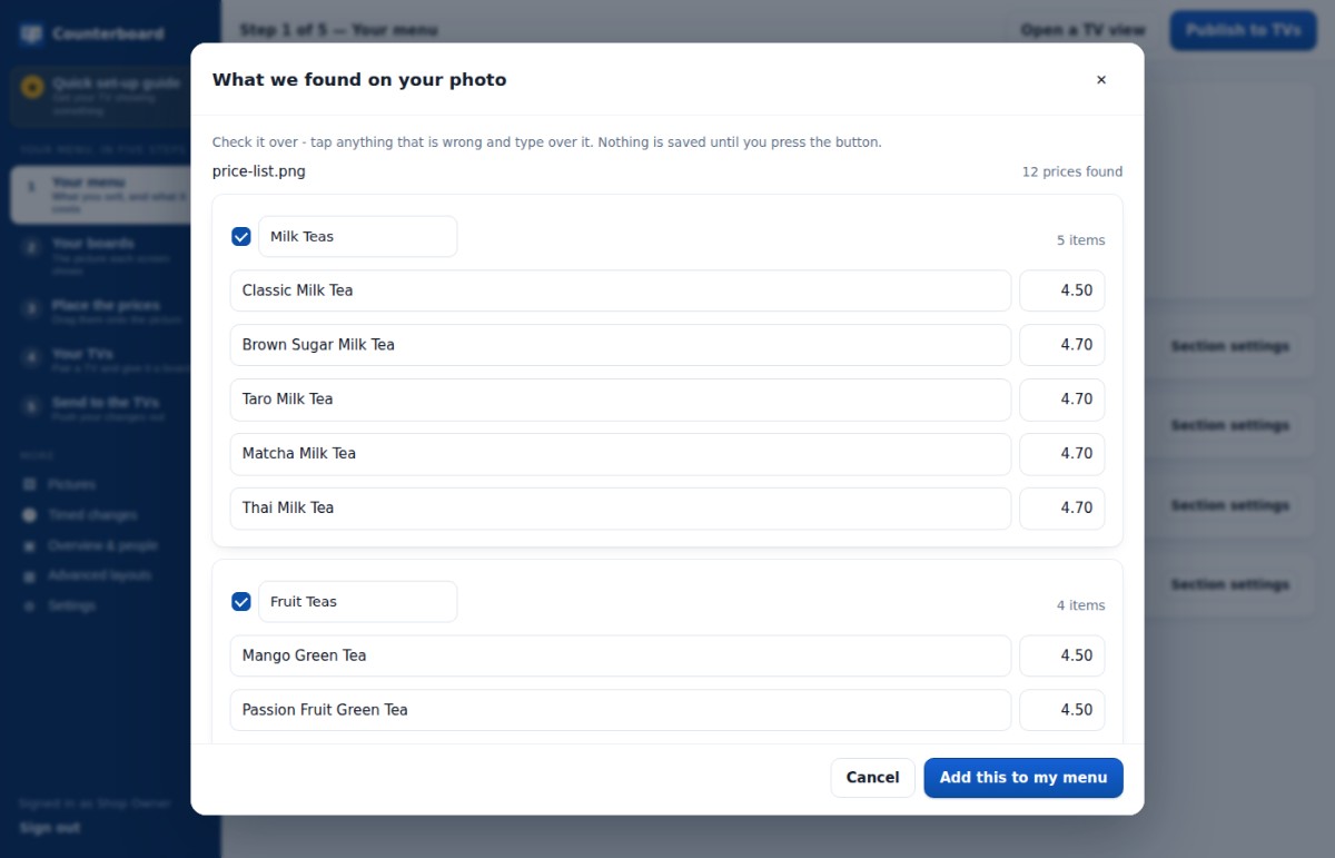 The dashboard showing prices read off a photograph, ready to check